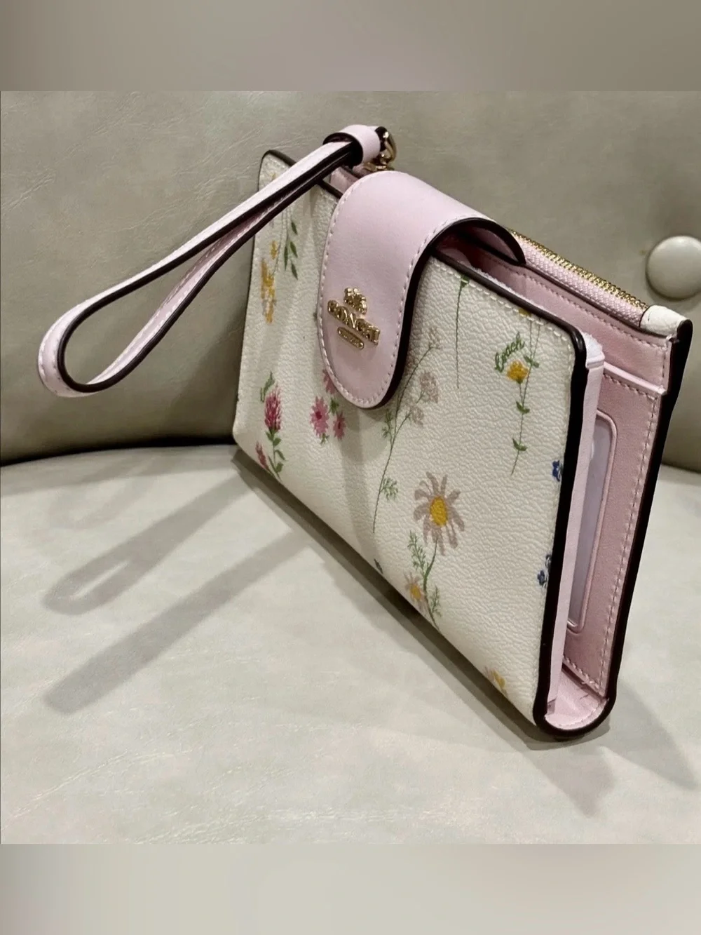 Coach white Leather Multi Color Flower Print phone Wristlet Wallet.